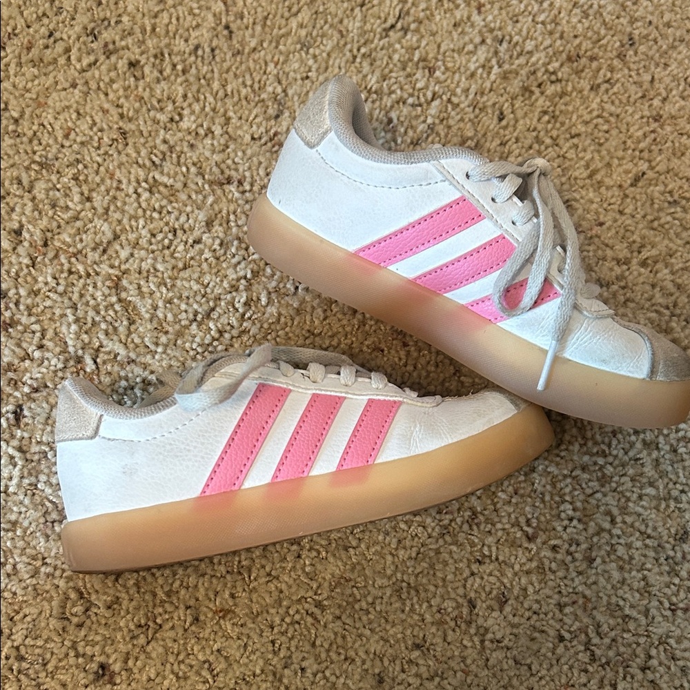 Pink and White Adidas sneakers